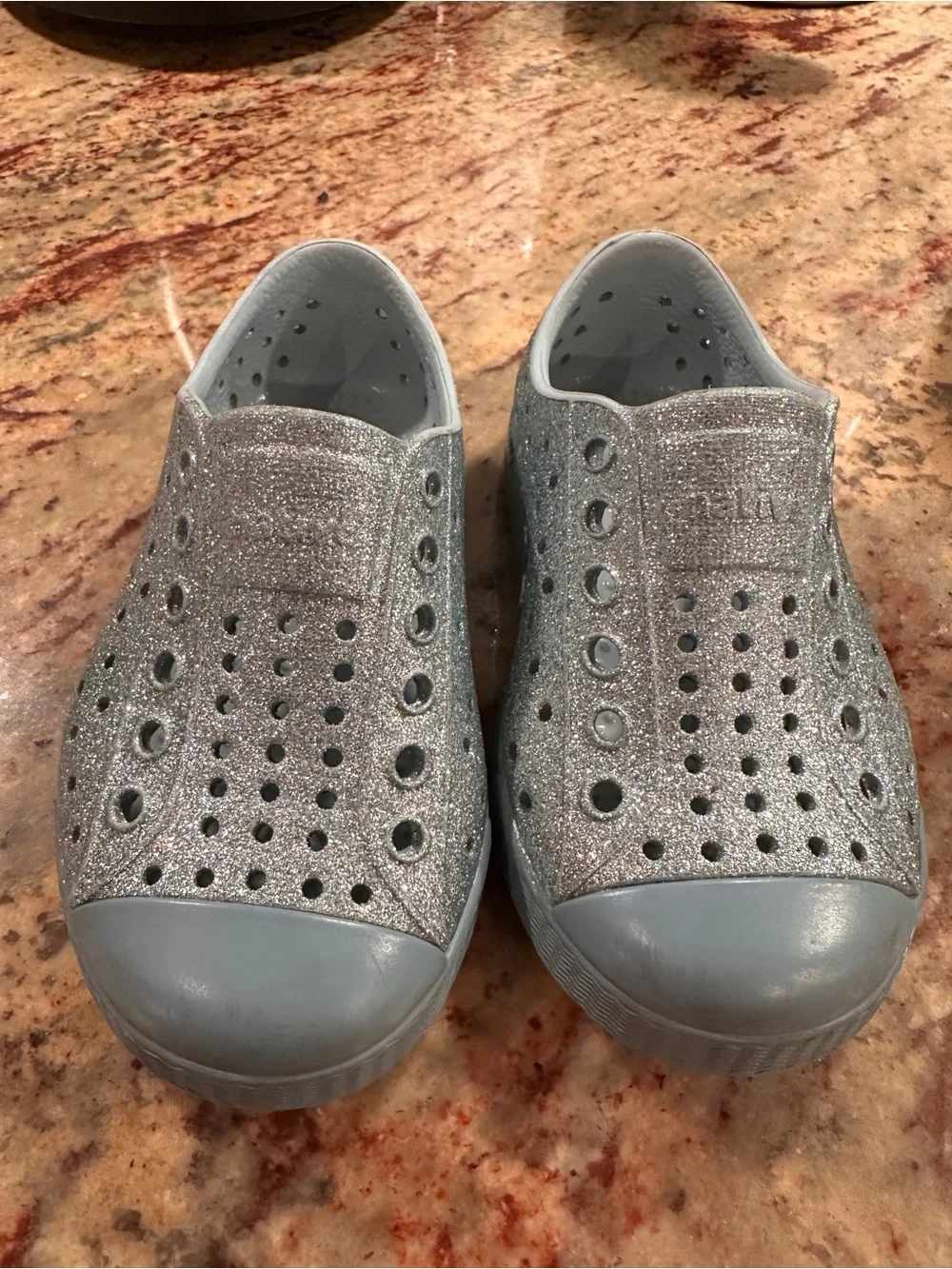2 pairs of Native Toddler Silver Glitter Jefferson and white Slip-On Water Shoes
